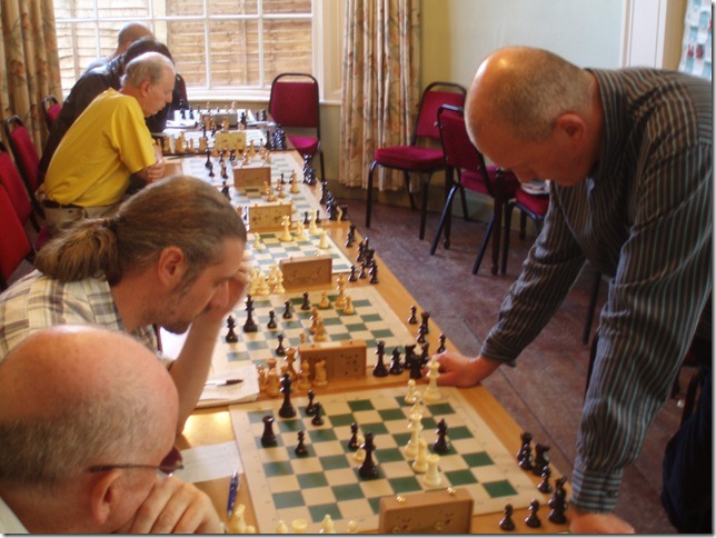 Club members playing a simultaneous display against IM Andrew Martin at a Trowbridge Chess Club weekend event